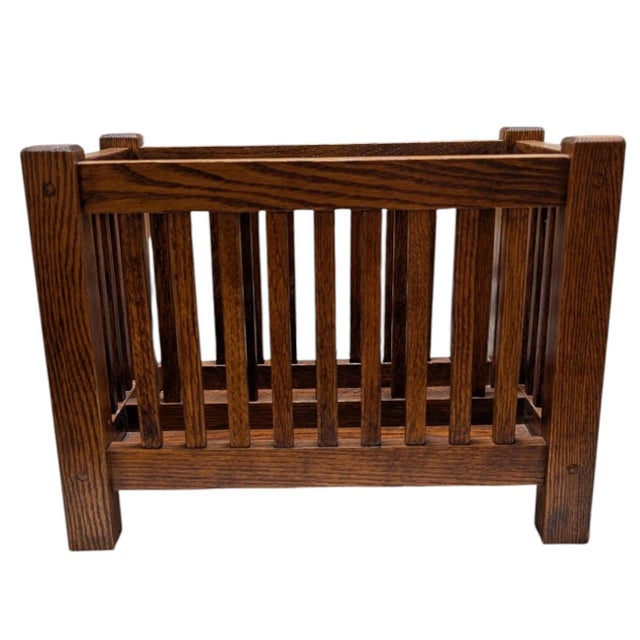 Add a touch of timeless Arts & Crafts elegance to your home with this exceptional Mission Oak Magazine Rack. Produced in...