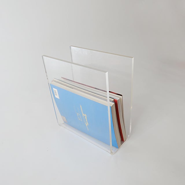 Vintage Acrylic Glass Magazine Rack attributed to David Lange, 1970s, in Very Good conditions. Designed 1970 to 1979 This...