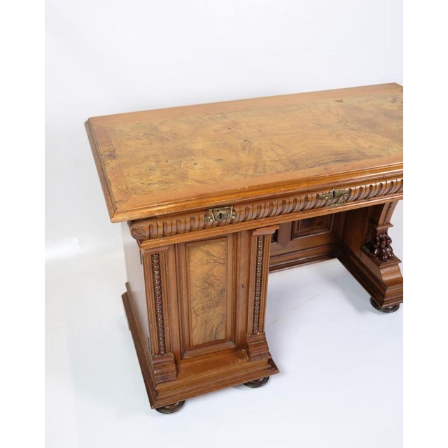 Antique desk with a small side cabinet for storage, made in walnut from the 1860s. In very nice condition. Dimensions:...