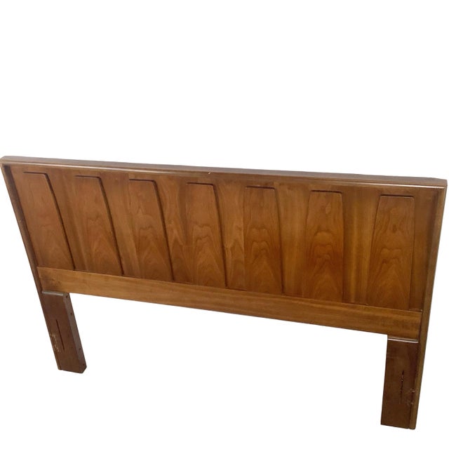 There’s a quiet confidence to good mid-century design, and this walnut headboard has it in spades. Vertical panels of...