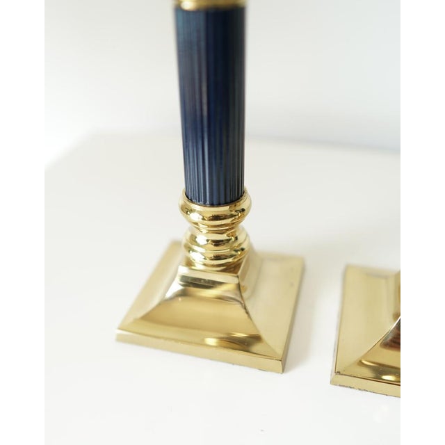 Elegant gilded brass candle holders, with a timeless design typical of the 1970s. ・Brass ・Condition: Very good general...