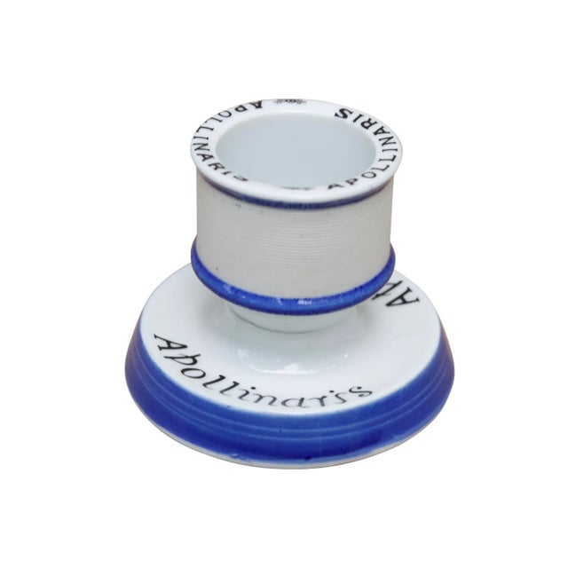 An Apollinaris ceramic match striker and holder. Traditionally used in cafes, bars, etc. We have more match strikers...