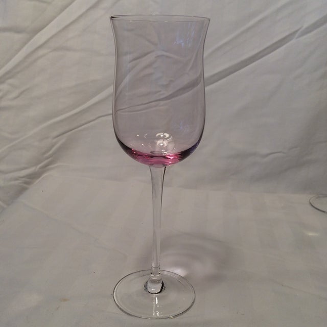 Beautiful set of 11 Italian assorted colors wine glasses. 2 purple, 2 blue, 2 green, 2 orange, 2 pink and 1 yellow.