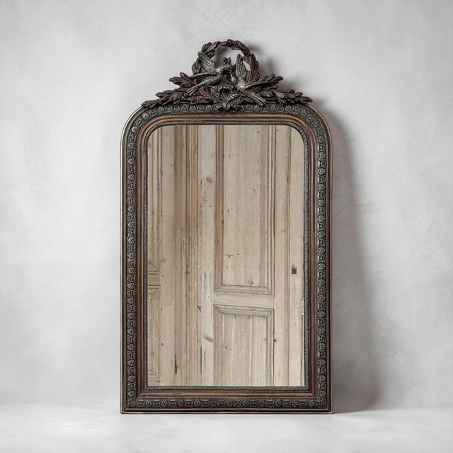 Romance, symbolism, and refined French design come together in this antique mirror, created in the Louis XVI and Napoleon...