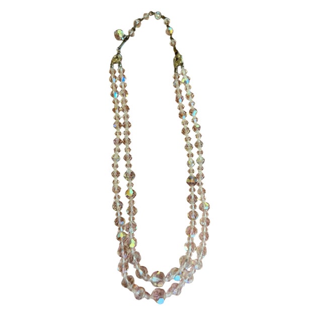 A beautiful beaded necklace from the mid-century. Graduated faceted glass crystal beads will compliment any outfit that...