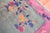 Enchanting early 20th century Chinese Art Deco carpet with a spacious floral design in dominant accents in green and pink....