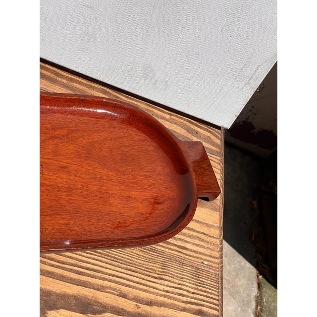Gorgeous petite serving tray or catchall! Great sleek design and beautiful color in this Danish wooden tray! Please check...