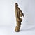 Carved with precision and adorned with raffia, shells, and fabric, the Dogon Abstract Fetish Figure Knife reflects the...