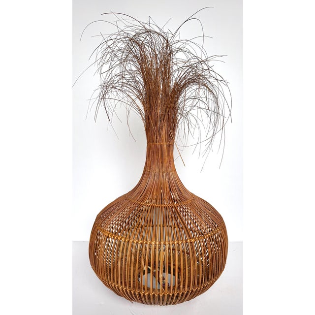Italian Woven Rattan & Brass 'Onion Grass' Table Lamp, Circa 1970s A whimsical Italian Woven Rattan & Brass 'Onion Grass'...
