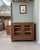 A fauvette sideboard with clean lines, a direct descendant of post-war art deco design. This parisian glass-fronted...