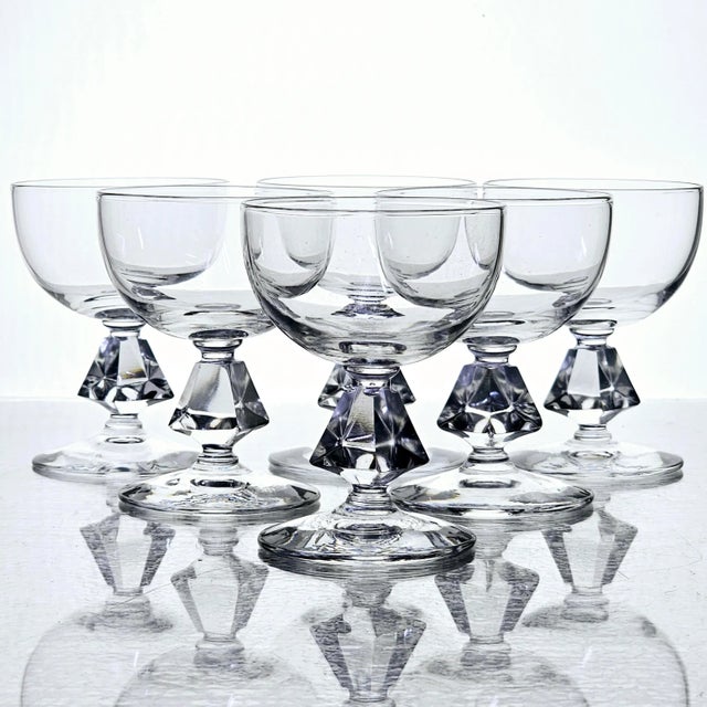 This set of six Bryce Aquarius liquor cordial glasses reflects mid-century American crystal design characterized by...