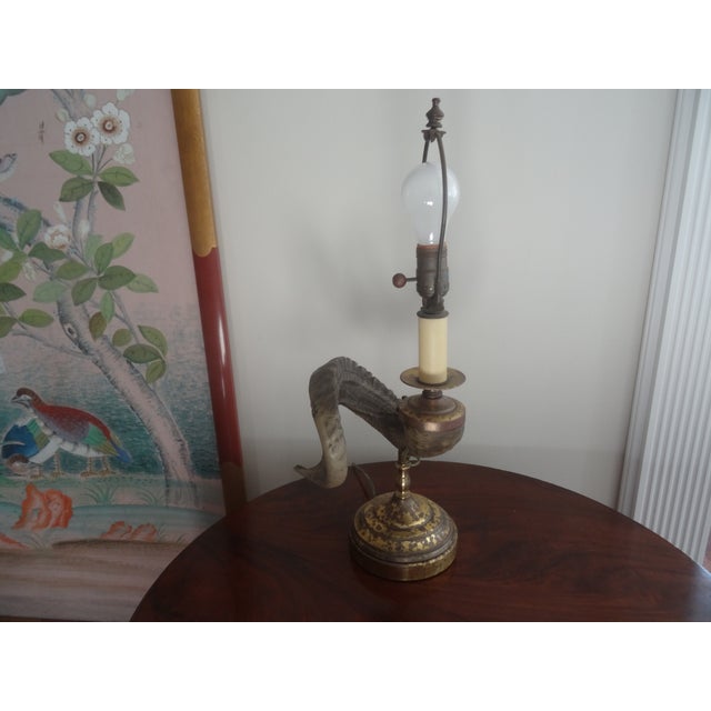 A vintage Ram Horn Lamp with an interesting brass Patination.