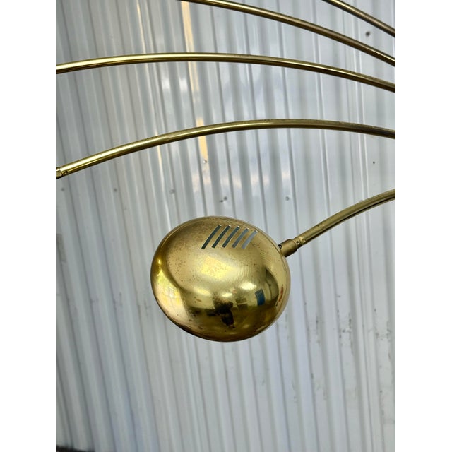 A classic Italian modern Guzzini design in hard to find gold tone finish. Carrara marble base. Arms adjust laterally and...