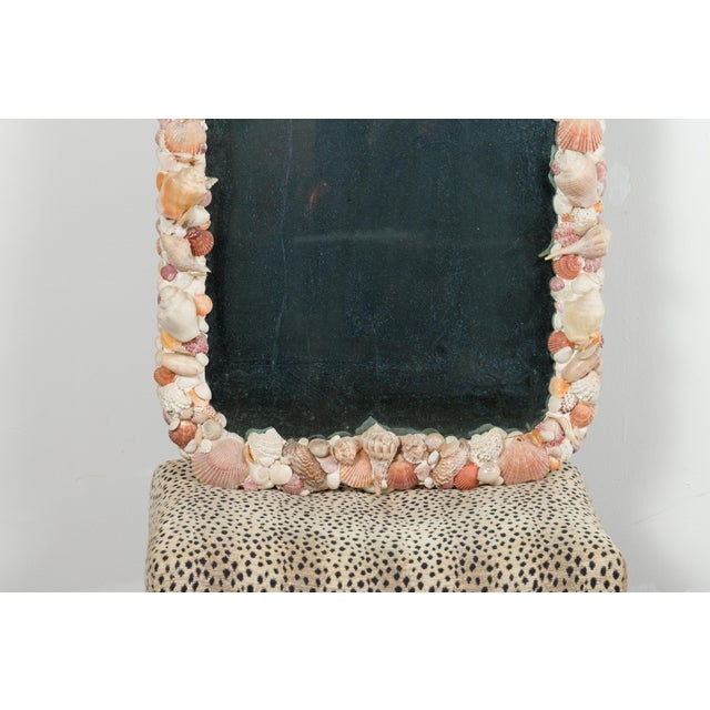 An American crested mirror from the mid 20th century, with shell motifs. Made in the USA during the second quarter of the...