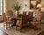 This set of six dining chairs exemplifies refined Baroque Revival–style craftsmanship, consisting of four side chairs and...
