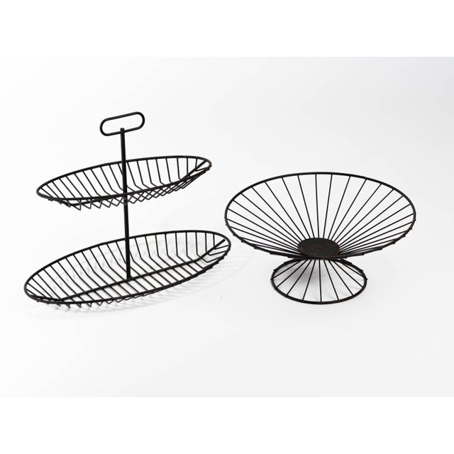 Raymor two-tiered black wire serving stand with handle. Matching circular pedestal bowl. Bowl measures 6 inches height x...