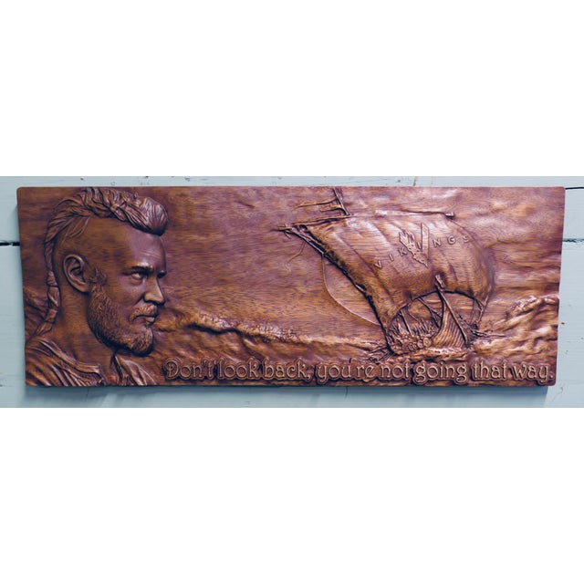 This is a Viking inspired carving and the quote, "Don't look back, you're not going that way". This is beautifully hand-...