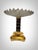 This exquisite centerpiece is a testament to the fine craftsmanship of 19th-century France. Crafted from gilded bronze and...