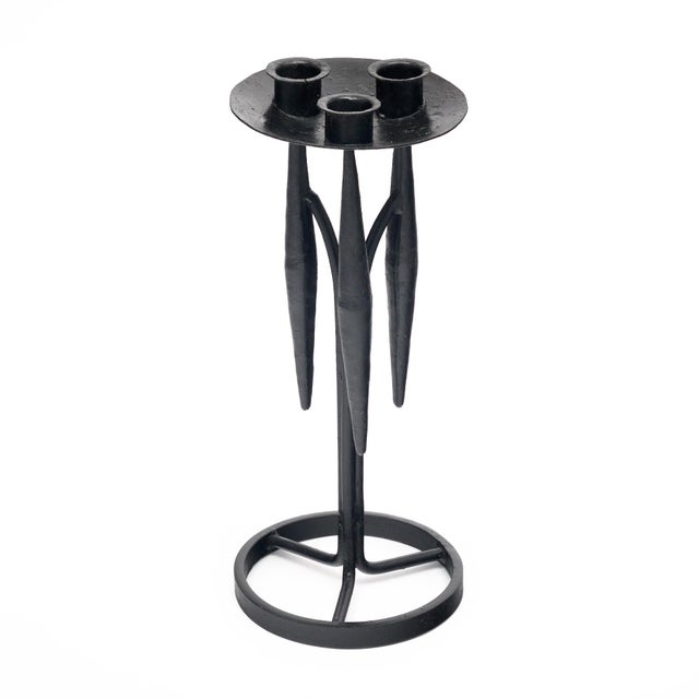 Candlestick from the Art Deco period in France. This piece is made hand hammered iron in the Diego Giacometti style. It is...