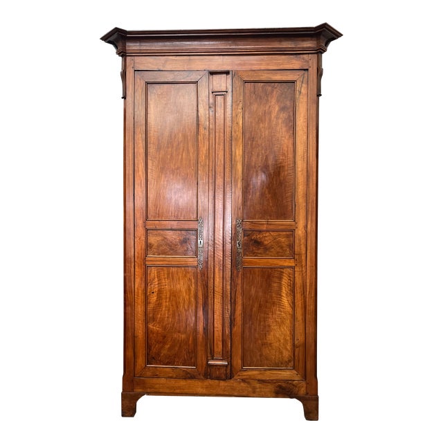 Early 19th Century French Walnut Chateau Armoire For Sale