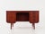 The desk was made in the 1970s, Danish production. The structure and the top are covered with teak veneer. The legs, made...