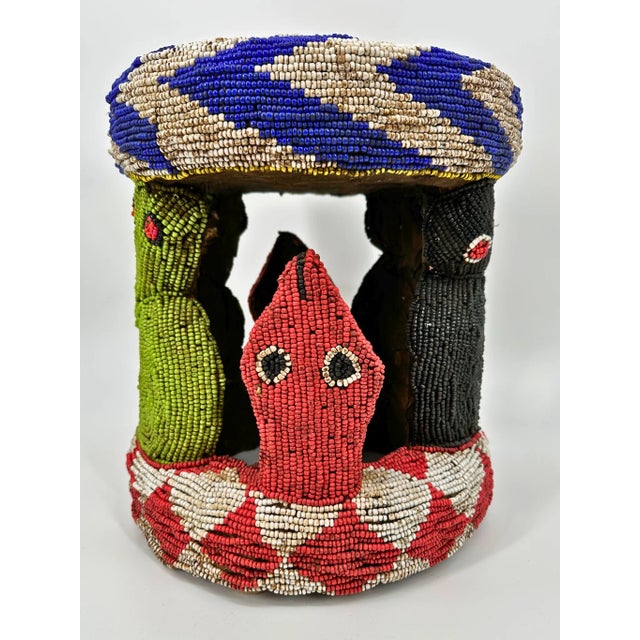 A gorgeous example of the Bamileke Beadwork on this piece. Each of the motifs is associated with a distinct meaning...