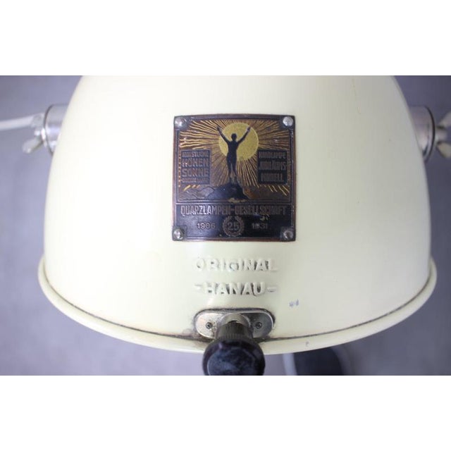 This authentic hanau quartz sun lamp, manufactured by quarzlampen-gesellschaft hanau in germany during the 1930s, is a...