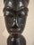 This hand carved male figure standing has been created by the Fang people of central Africa, possibly Cameroon. With a...