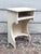Small Vintage Cream Cubby Side Table Estimated circa 1940s Solid wood, chippy pre-loved finish Measures 29” tall x 18“...