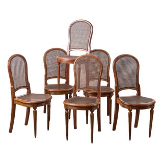 Set of 6 | French Louis XVI Style Dining Chairs With Hand Caned Seats + Backs With Fluted Legs (C. 1920) For Sale