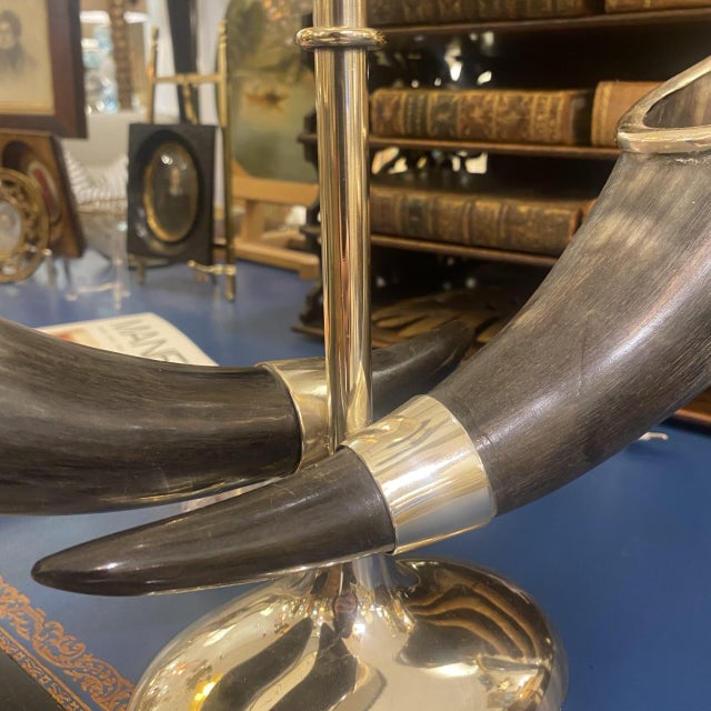 Early 20th-century table lamp with original horns, preserved in perfect condition. Silver-plated frame and custom-made,...