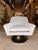 Contemporary swivel accent chair featuring a graceful curved silhouette and clean, tailored lines that bring effortless...