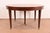 A beautiful Federal or Hepplewhite style extension dining table In the manner of Baker Furniture USA, Circa 1940s Gorgeous...