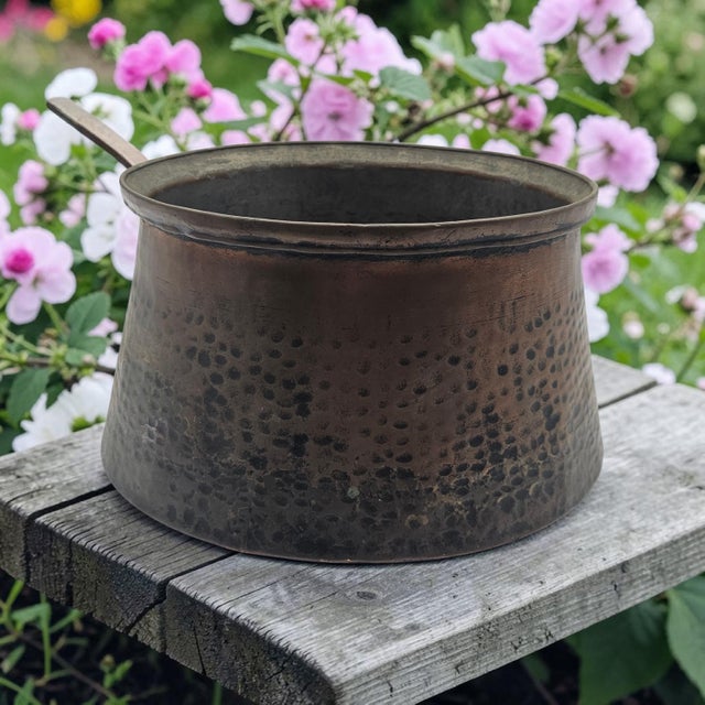 An antique hand-hammered copper basin or jam pot, likely of French or English origin and dating to the late 19th century....