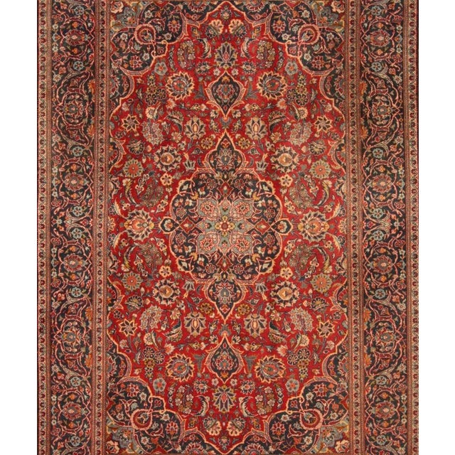 Hand-knotted rug | Size: 208cm x 132cm | Material: 100% wool (pile), 100% cotton (warp) | Number of knots: approx. 200,000...