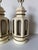 Striking pair of 1970s Hollywood Regency table lamps inspired by classic Palm Beach and Pagoda-style design. Crafted in...