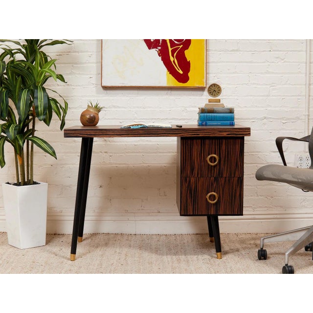 Find the perfect modern one-of-a-kind desk or table for your office space so you can create, explore, and dream up all...