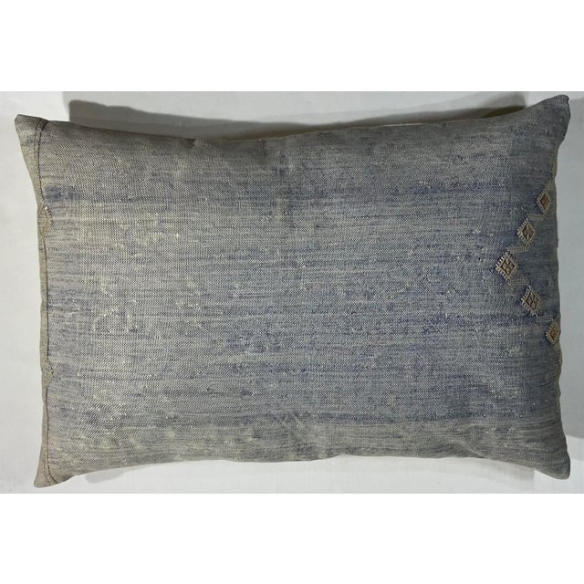 Beautiful pillow made of flat-weave rug fragment, light indigo color with geometric motifs, fresh quality insert, silk...