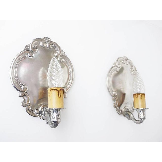 Pair of vintage pewter wall sconces made by August Weygang, Germany, circa 1900. August Weygang founded his pewter firm...
