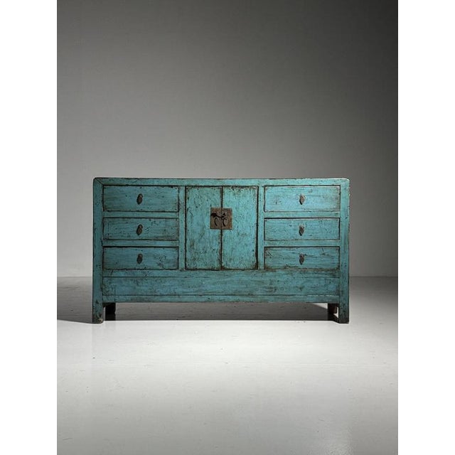 20th-century Asian sideboard. Solid wood sideboard. Lacquered blue with various drawers and two central doors. In very...