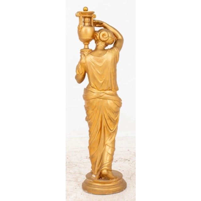 Neoclassical Style Gilded Plaster Female Figure Sculpture, possibly the Greek goddess Hebe, holding an urn and standing...