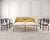 A refined Rue De Seine Cocktail Table designed by Holly Hunt measuring over 5 feet square. The bespoke table features a...
