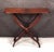 A fine 19th century English coaching or field table (folding) of mahogany featuring elegant serpentine-shaped turning for...