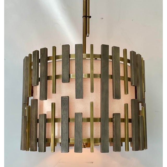 Timeless Mid-Century Modern Style Wood and Brass Pendant, flax linen shades, bray wood and brass, showroom floor sample...