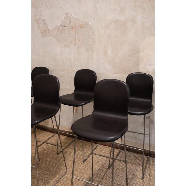 Set of six TATE bar stools designed by Jasper Morrison for Cappellini. Essential metal rod frame with integrated footrest....