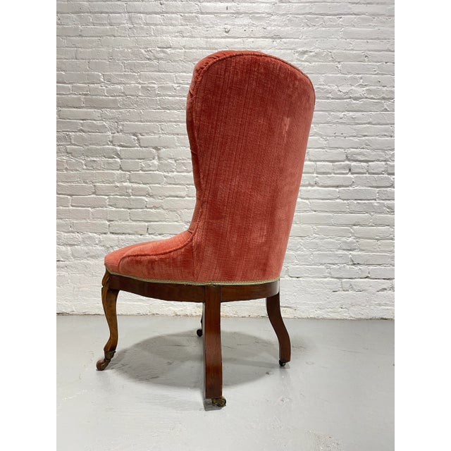 Victorian Tufted Slipper Chair | Pink Velvet Upholstery | Antique Accent Chair on Brass Casters, C. 1900's For Sale - Image 11 of 12