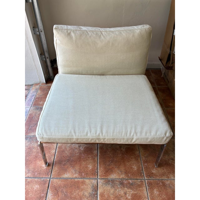 The Flexform "Happy" Chair, designed by Antonio Citterio, has a unique seat back comprised of a metal frame embellished...