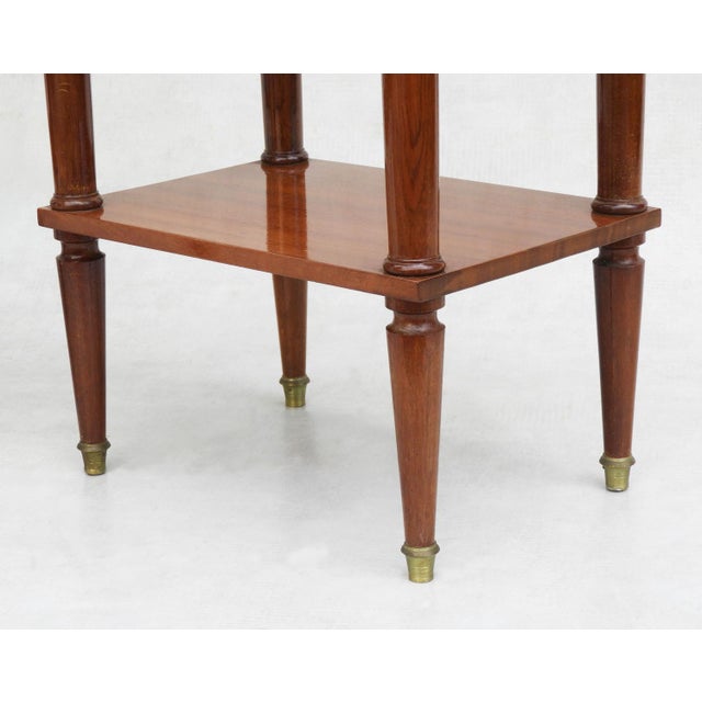 Elegant pair of French nightstands or side tables C1960. Classicly styled, single-drawer cabinets with marbled tops,...