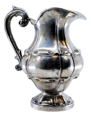 Gummed Silver Milk Jug with Raised Scrolls and Circular Base
