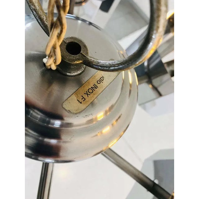 - Mid-century 6-light chandelier - In F1 stainless steel - Excellent general condition - From the 1960s - Made in Italy...